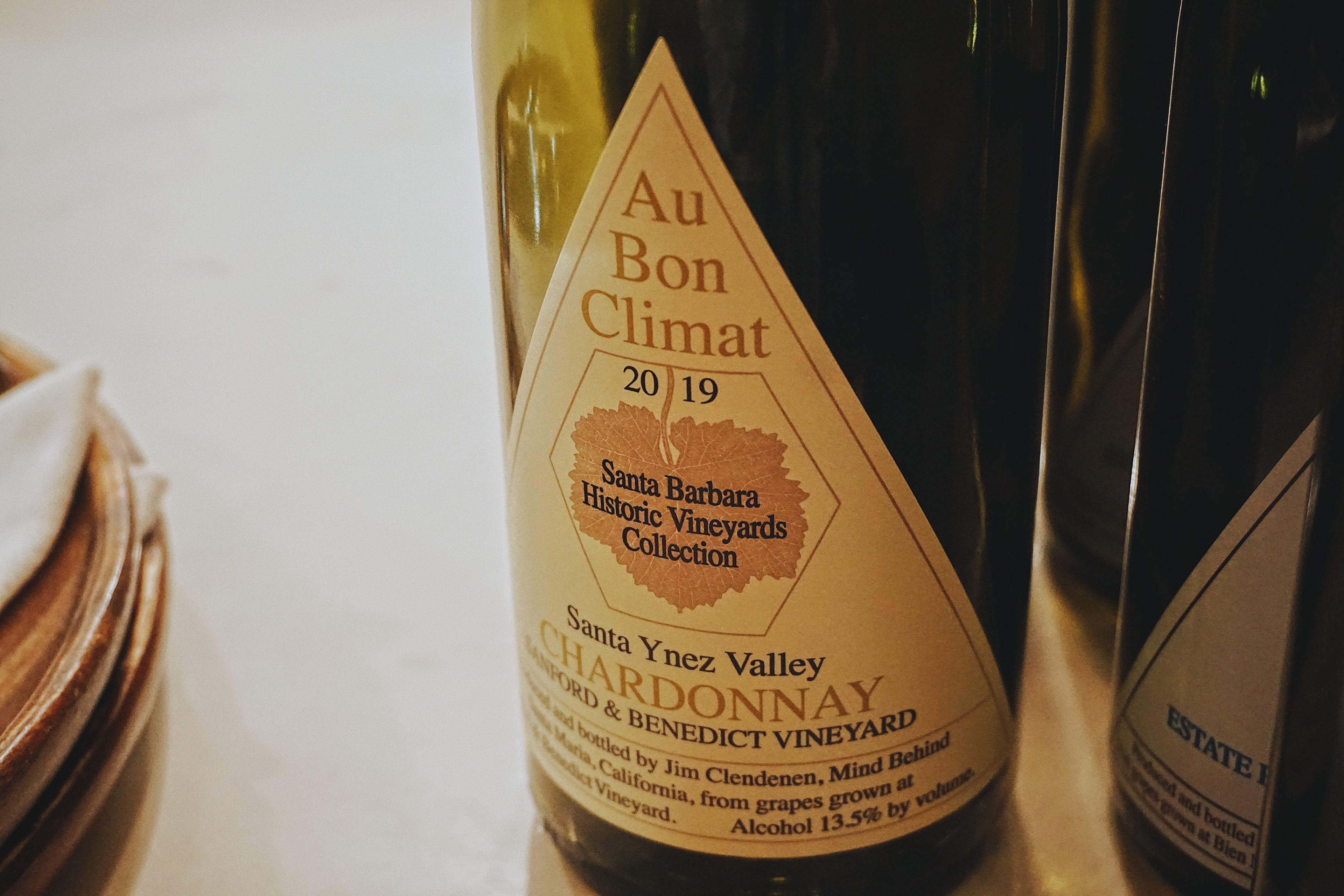 Au Bon Climat Chardonnay wine bottle with label on a white background