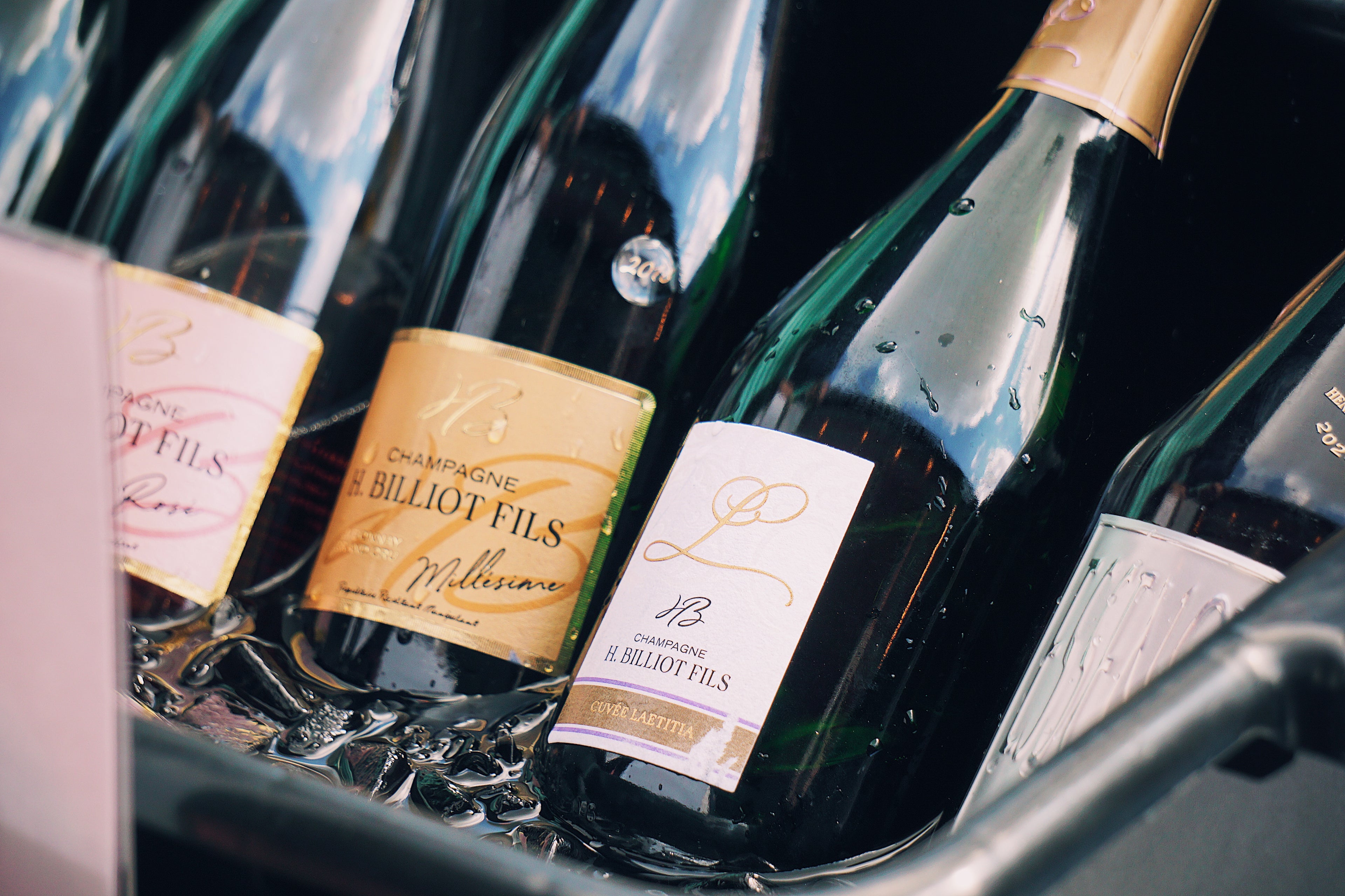 Champagne Billiot Fils bottles with visible labels in an ice bucket 