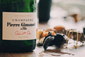 Bottle of Pierre Gimonnet & Fils champagne with blurred background